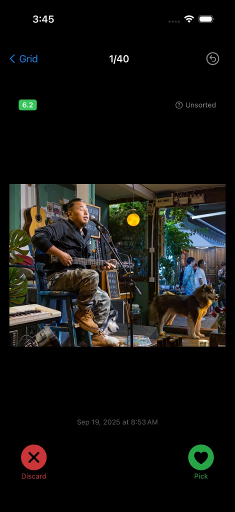 Full photo review with Pick and Discard buttons